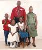 Children with down syndromme picture with the chairman mr alex emadit